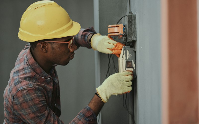 Electrician installing wiring